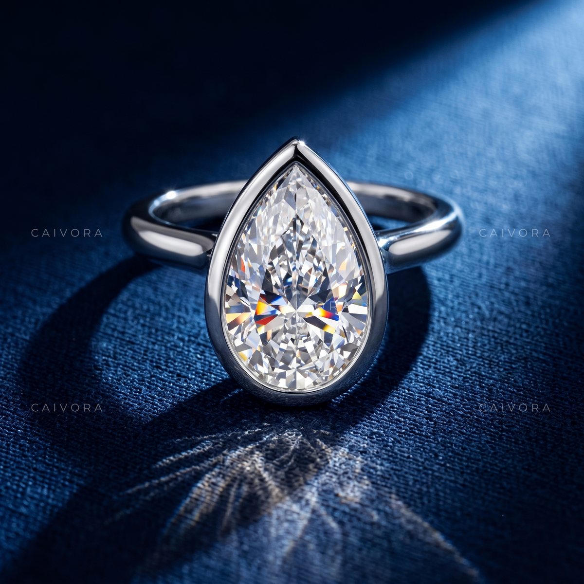 Pear Shaped Bezel Set Engagement Ring