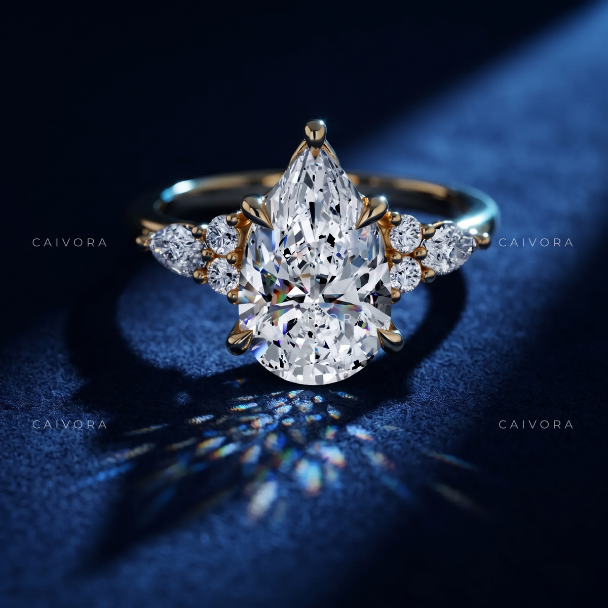 Elegant Latin-Inspired Engagement Ring with a Pear Cut Center Stone