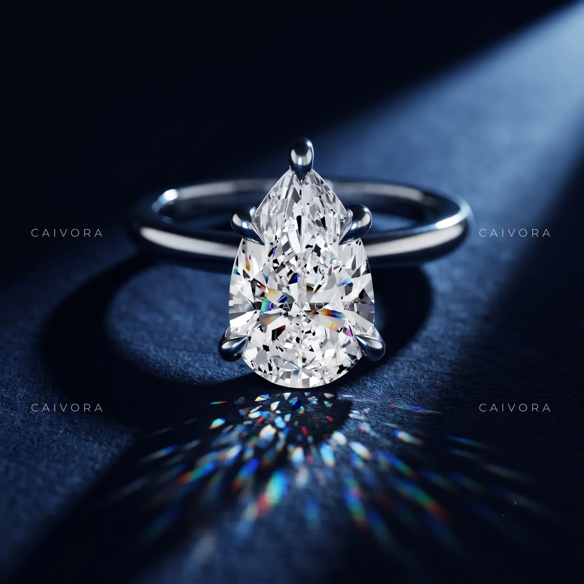 Pear Cut Four Prong Solitaire Engagement Ring