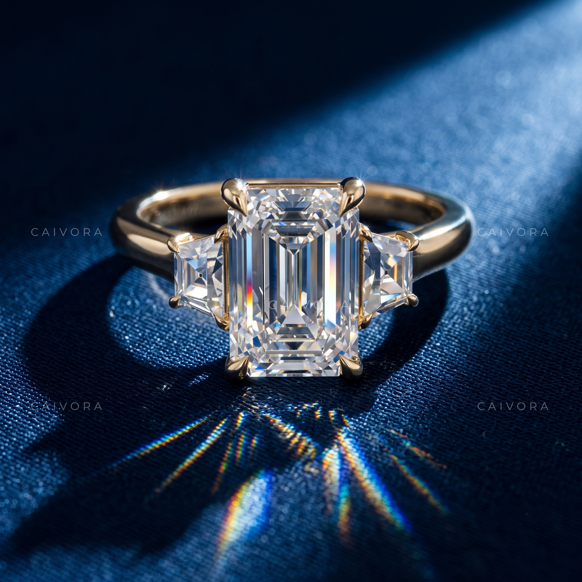 Modern Three Stone Engagement Ring with Emerald Diamond & Trapezoid Accents