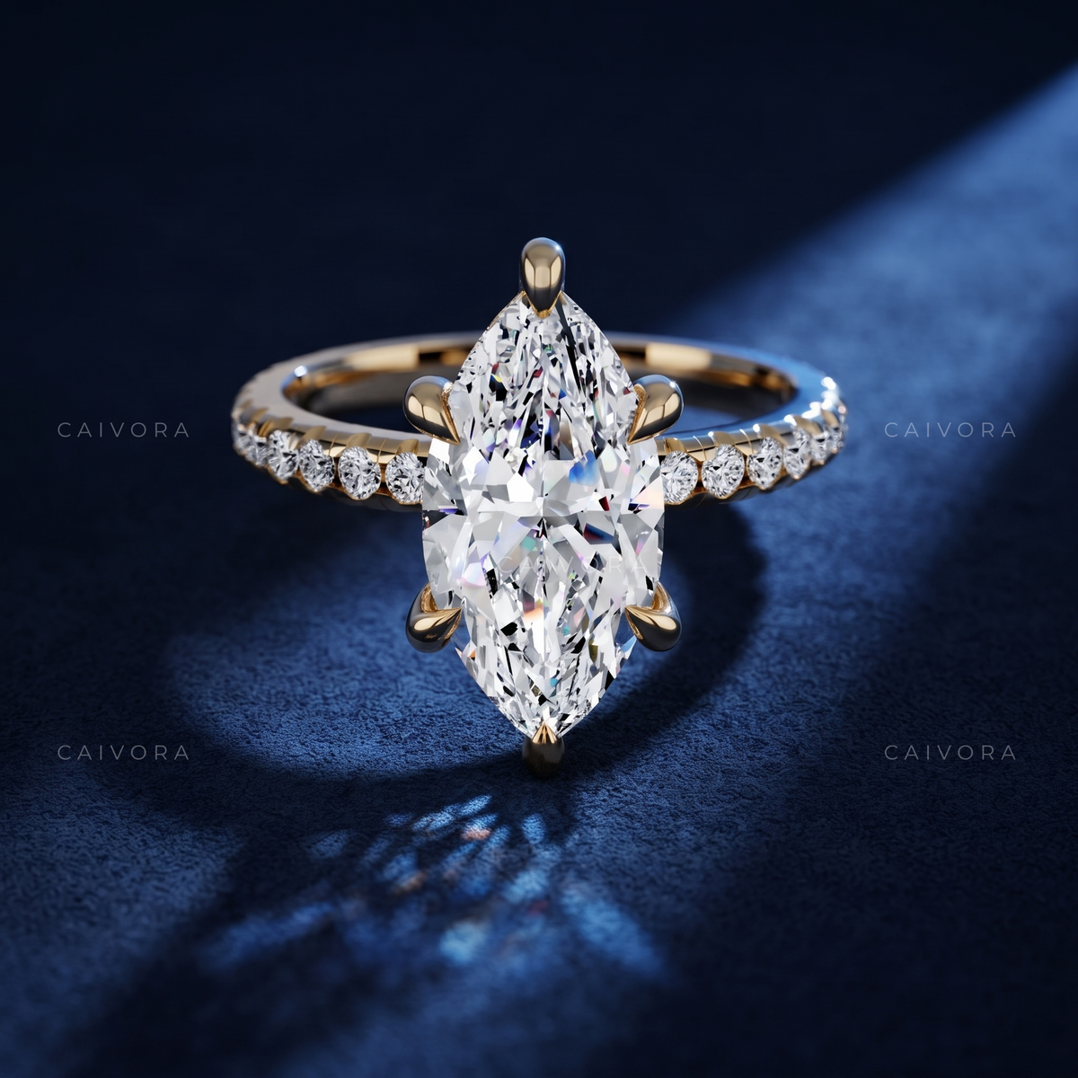 Marquise Cut Diamond Engagement Ring with Tapered Pave Band
