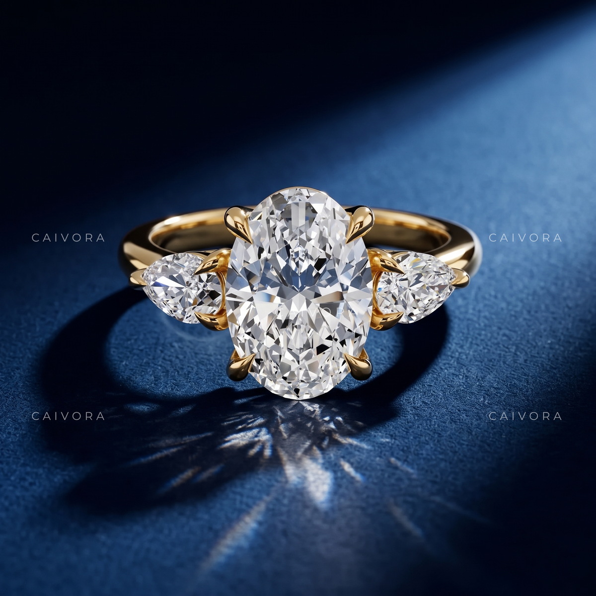 Sophisticated Three Stone Setting Highlighting an Oval Cut Center Diamond