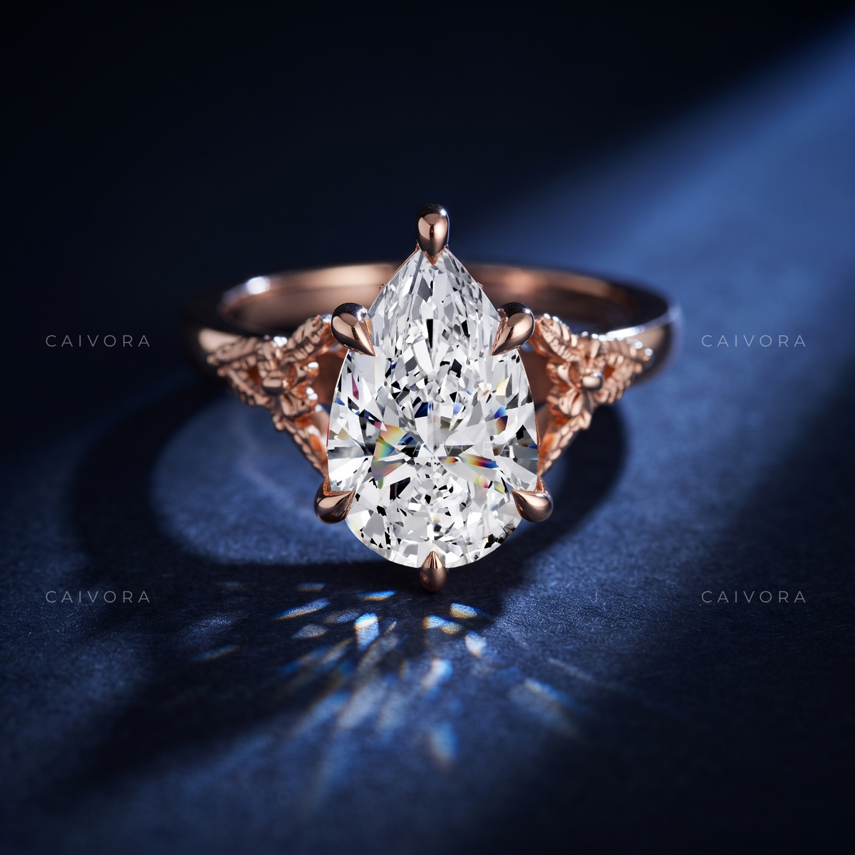 Roselle Contour Ring with a Pear-Shaped Diamond