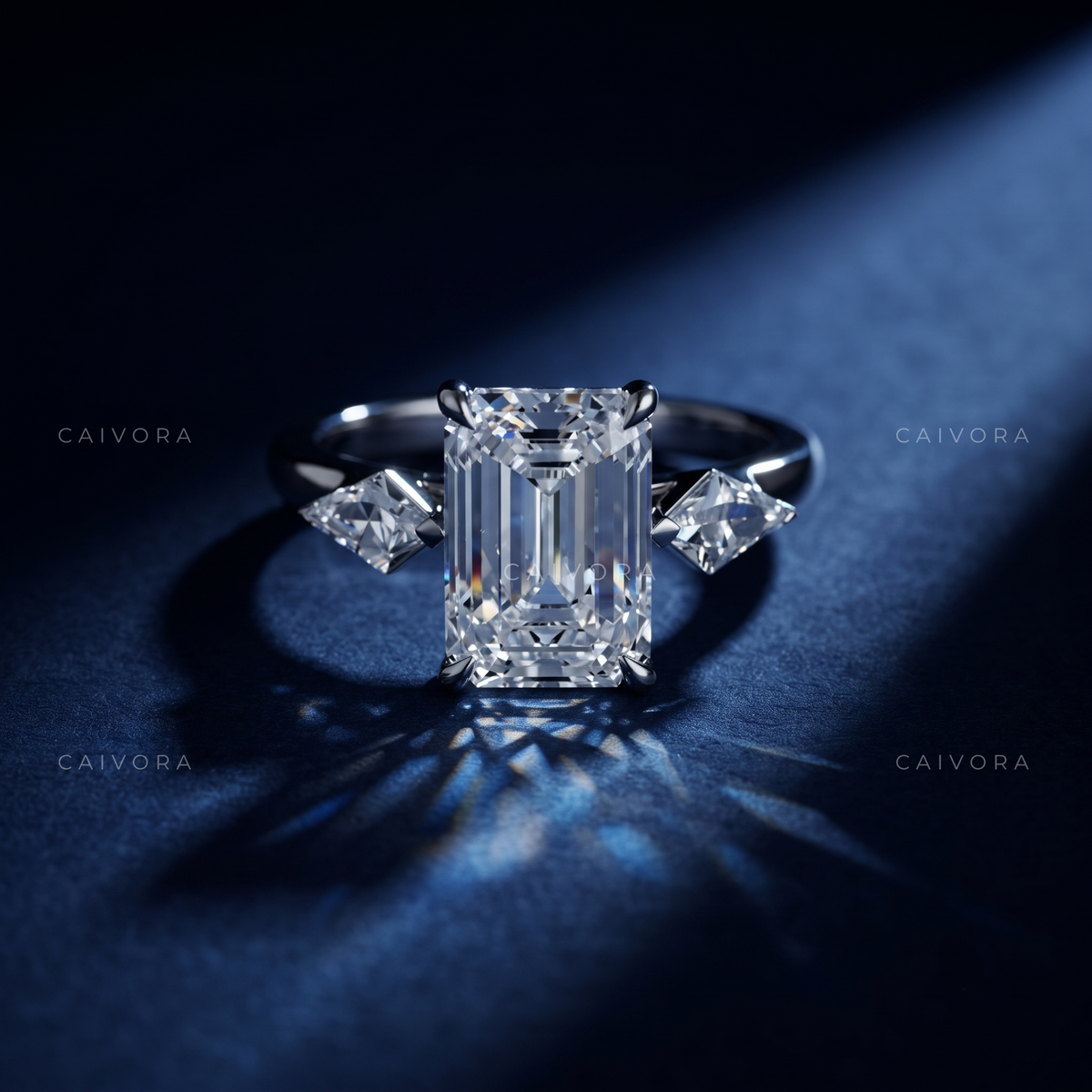 Contemporary Three Stone Engagement Ring with Emerald Diamond & Kite Accents