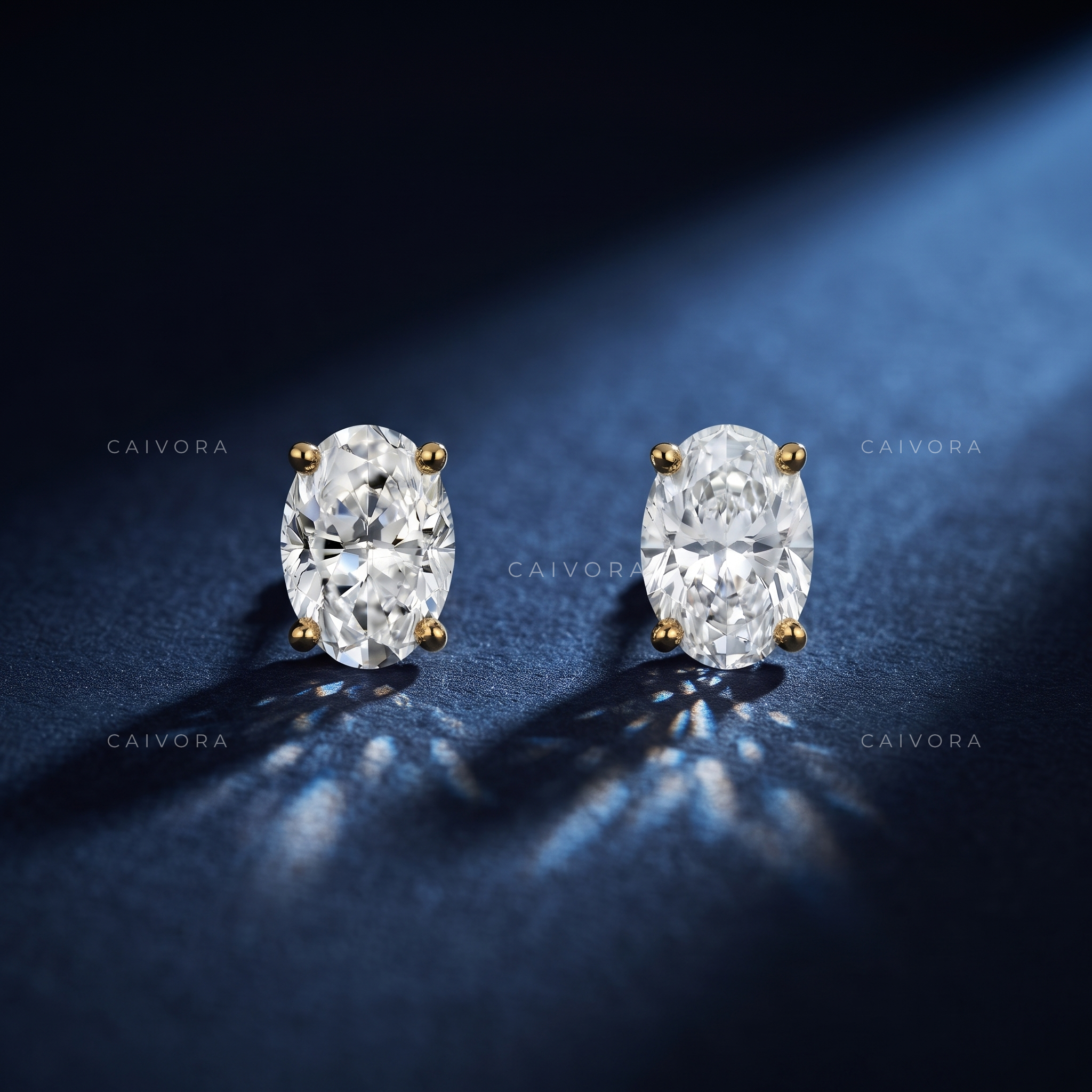 Prism Radiance Four-Prong Oval Solitaire Stud Earrings