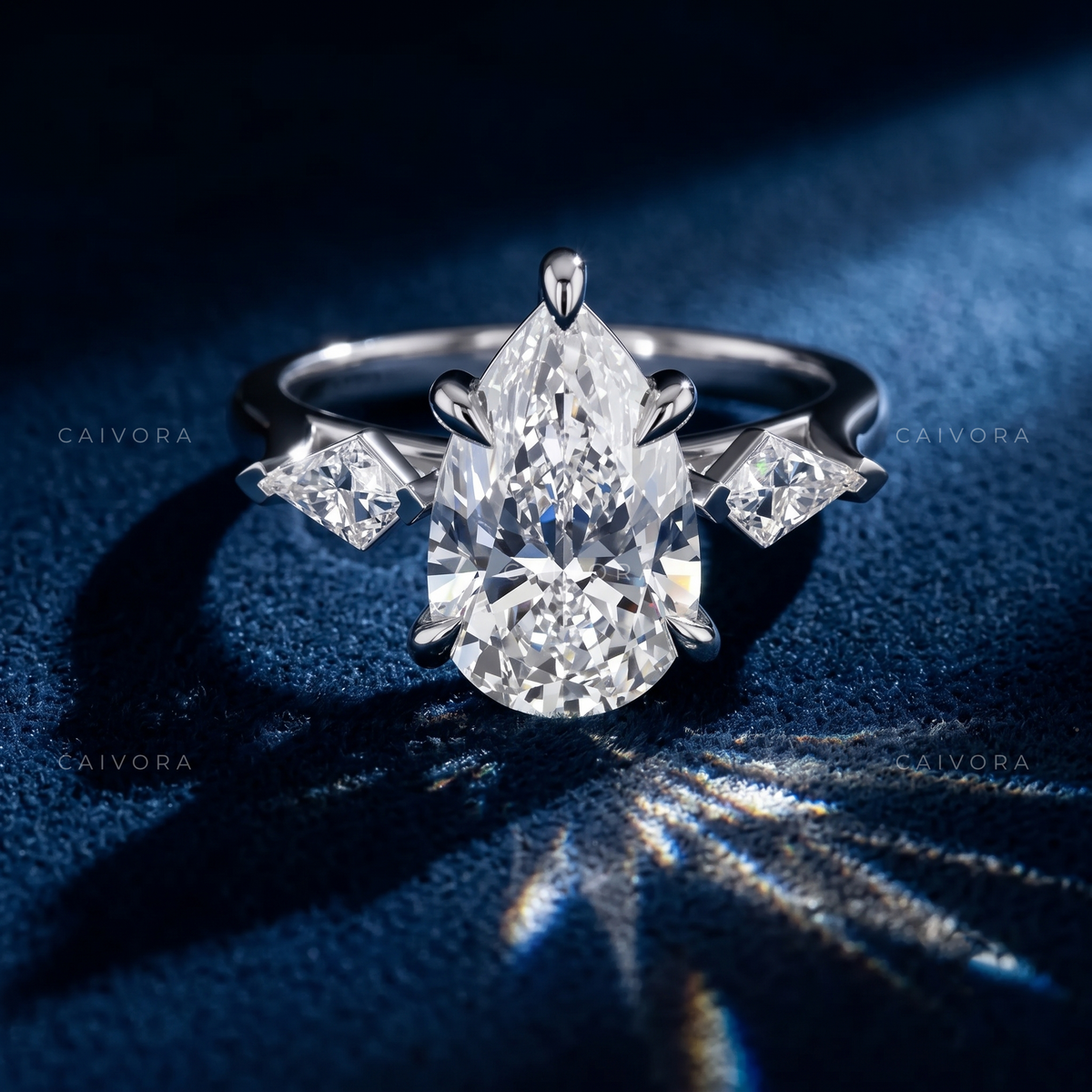 Elegant Three Stone Engagement Ring with Pear Diamond & Kite Accents