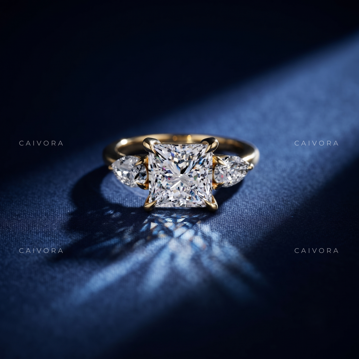 Vintage Inspired Three Stone Setting with an princess cut Center