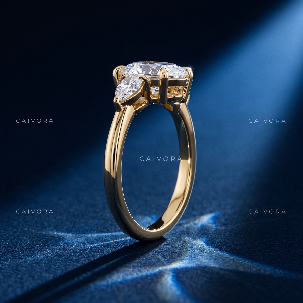 Sophisticated Three Stone Setting Highlighting an Oval Cut Center Diamond