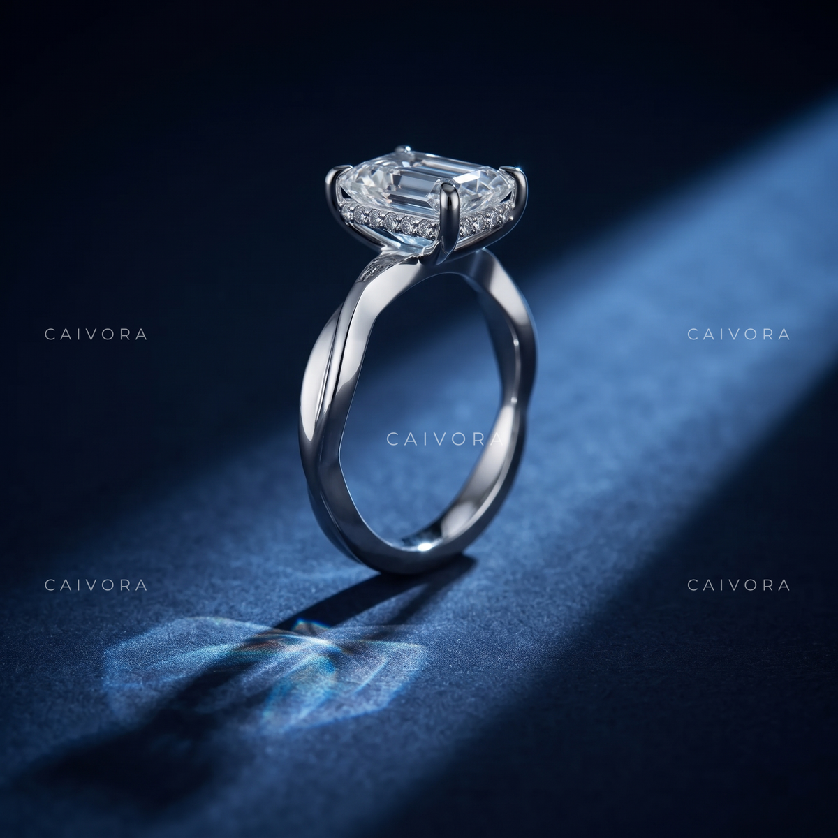 Emerald Cut Engagement Ring with a Refined Hidden Halo