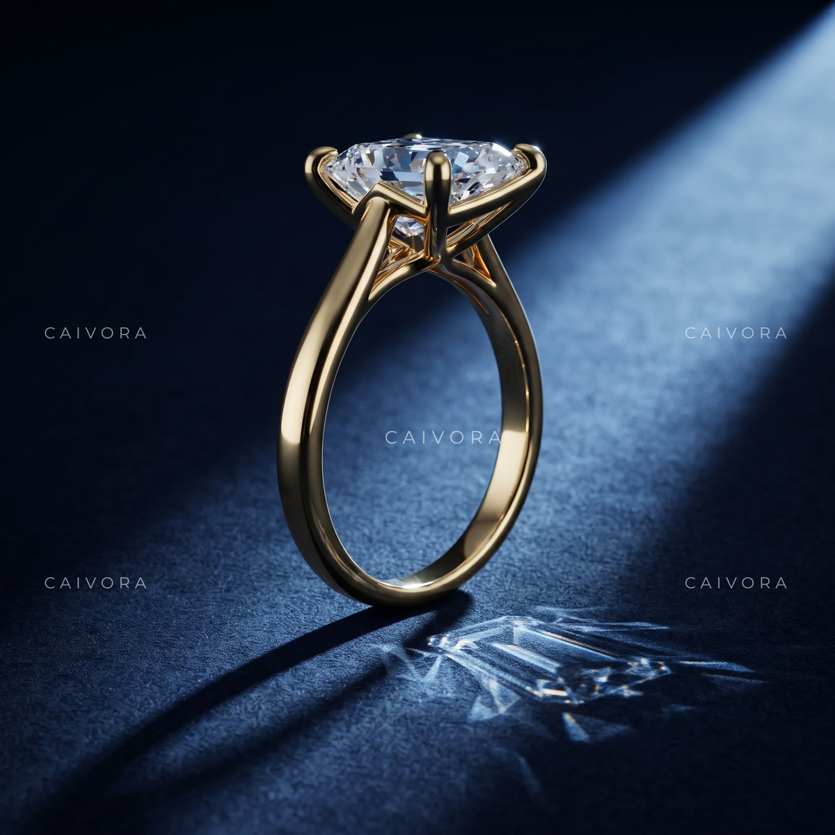 Refined Tapered Cathedral Setting with a Pear Cut Center Diamond