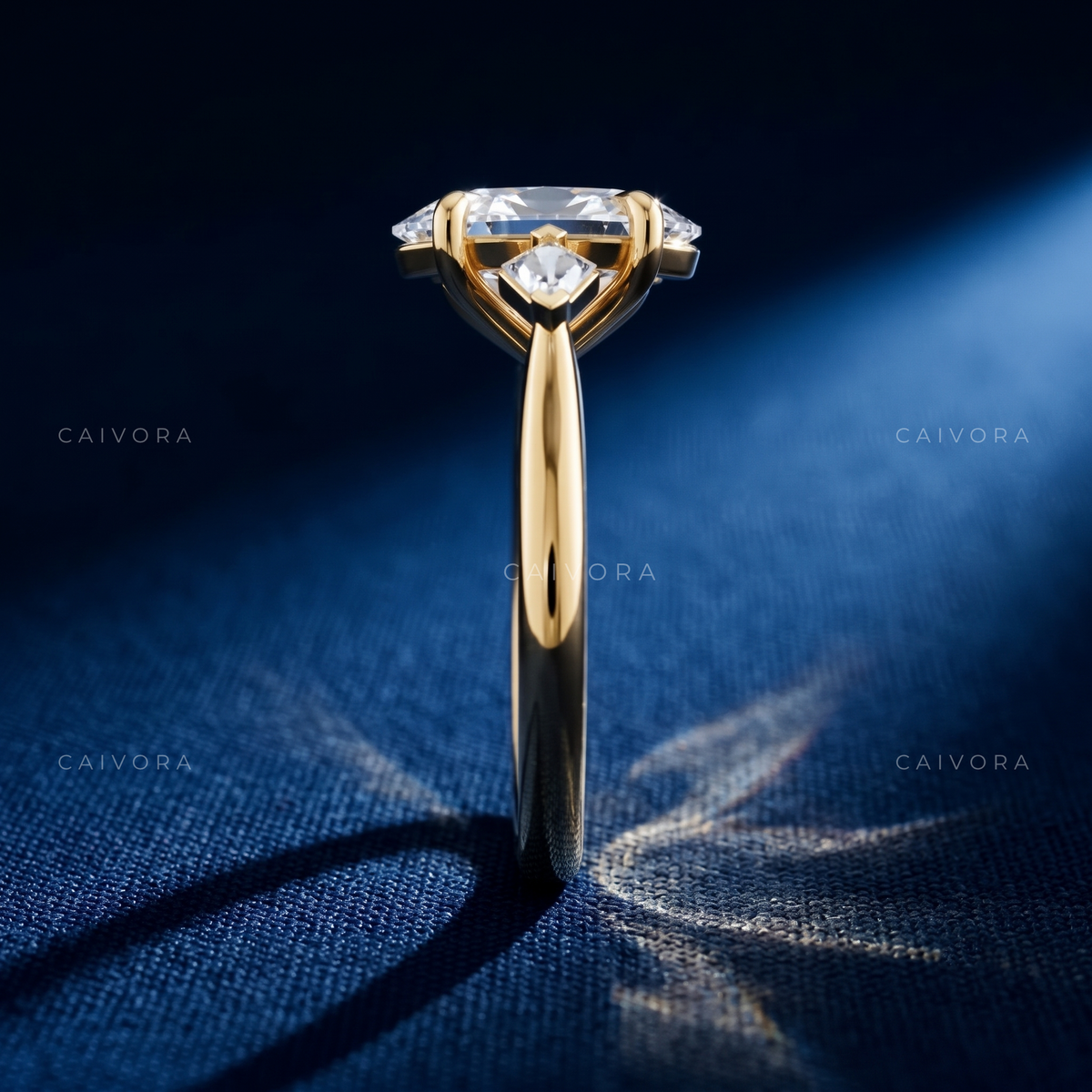 Classic Three Stone Engagement Ring with Oval Diamond & Kite Accents
