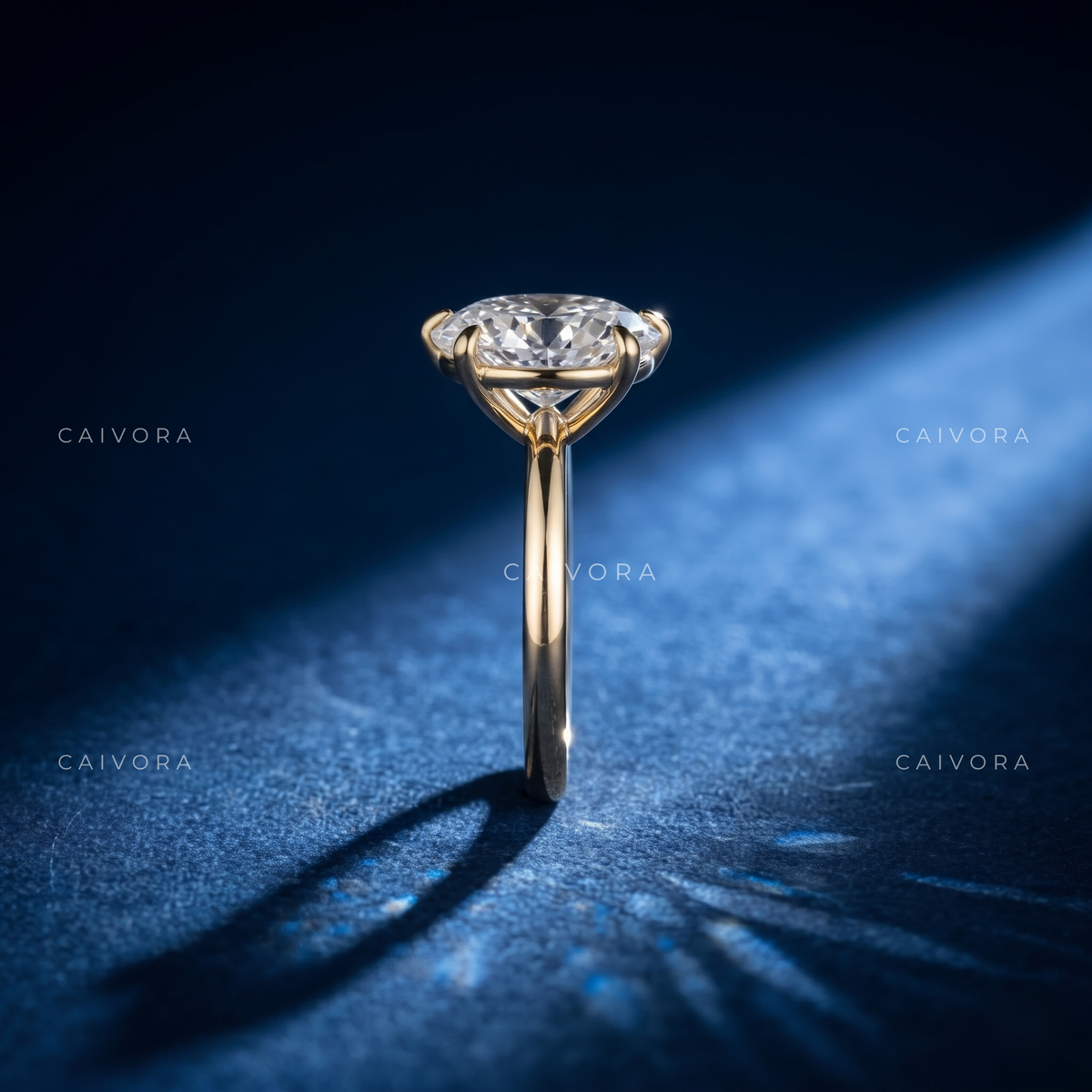 Classic Tapered Cathedral Engagement Ring Centered on a Round Cut Diamond