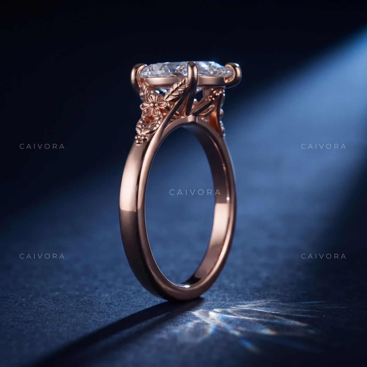 Roselle Contour Ring with a Pear-Shaped Diamond