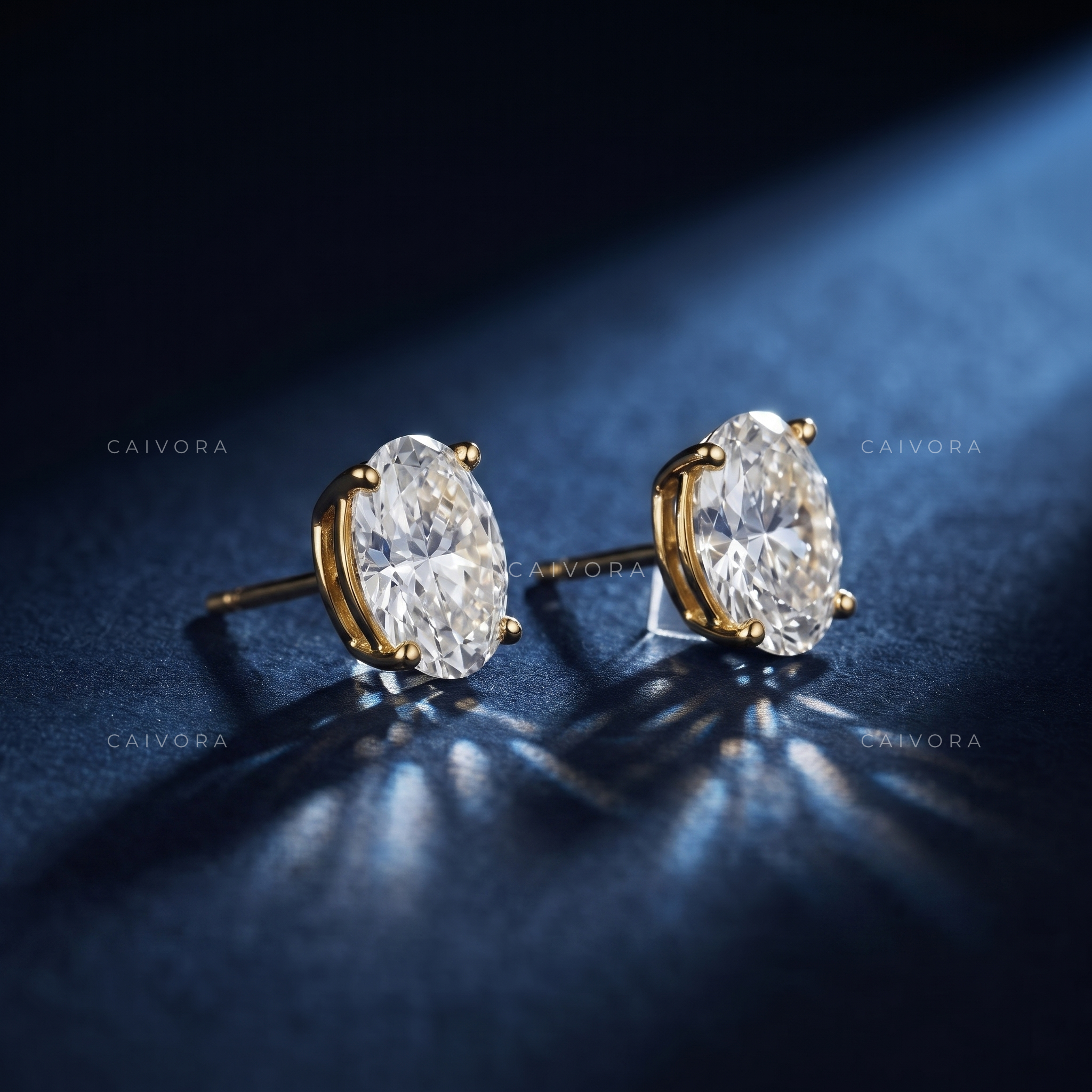 Prism Radiance Four-Prong Oval Solitaire Stud Earrings