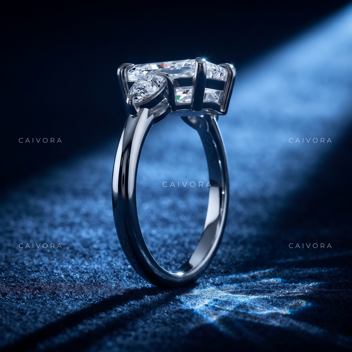 Refined Three Stone Setting Framed by a Radiant Cut Center Diamond