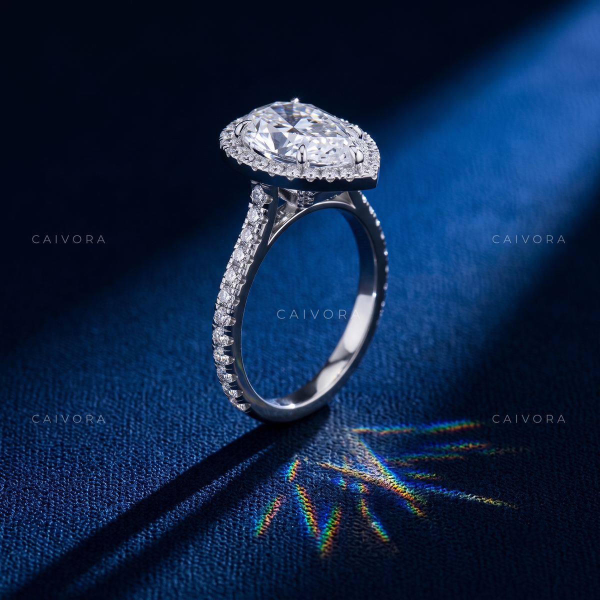 Elegant Halo Engagement Ring with Pear Diamond & Pavé Accents