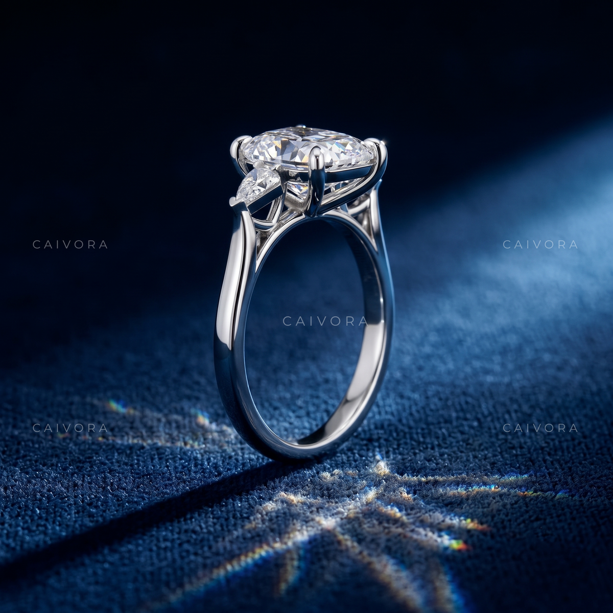 Elegant Three Stone Engagement Ring with Pear Diamond & Kite Accents