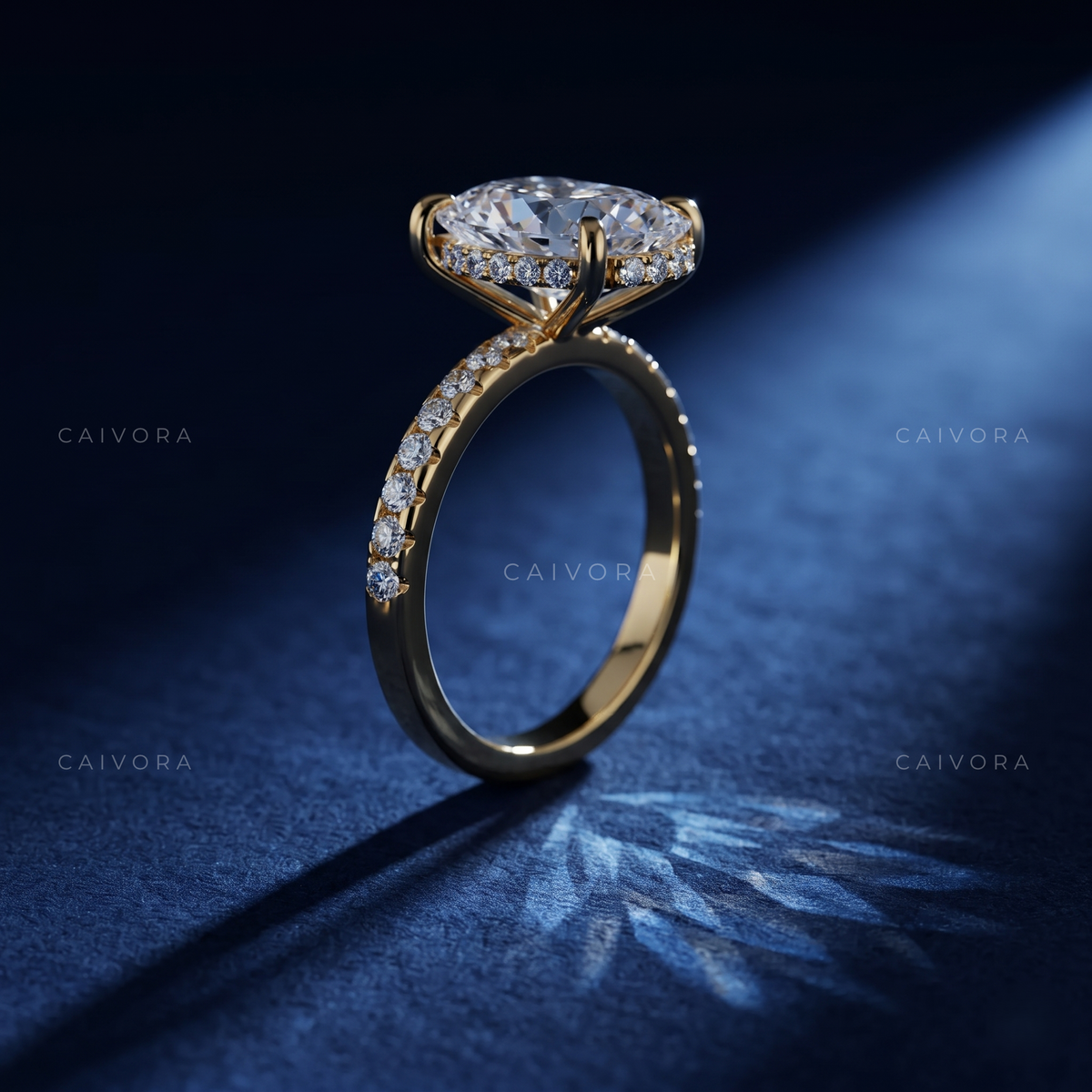 Moval Cut Diamond Engagement Ring with Brilliant Pave Accents