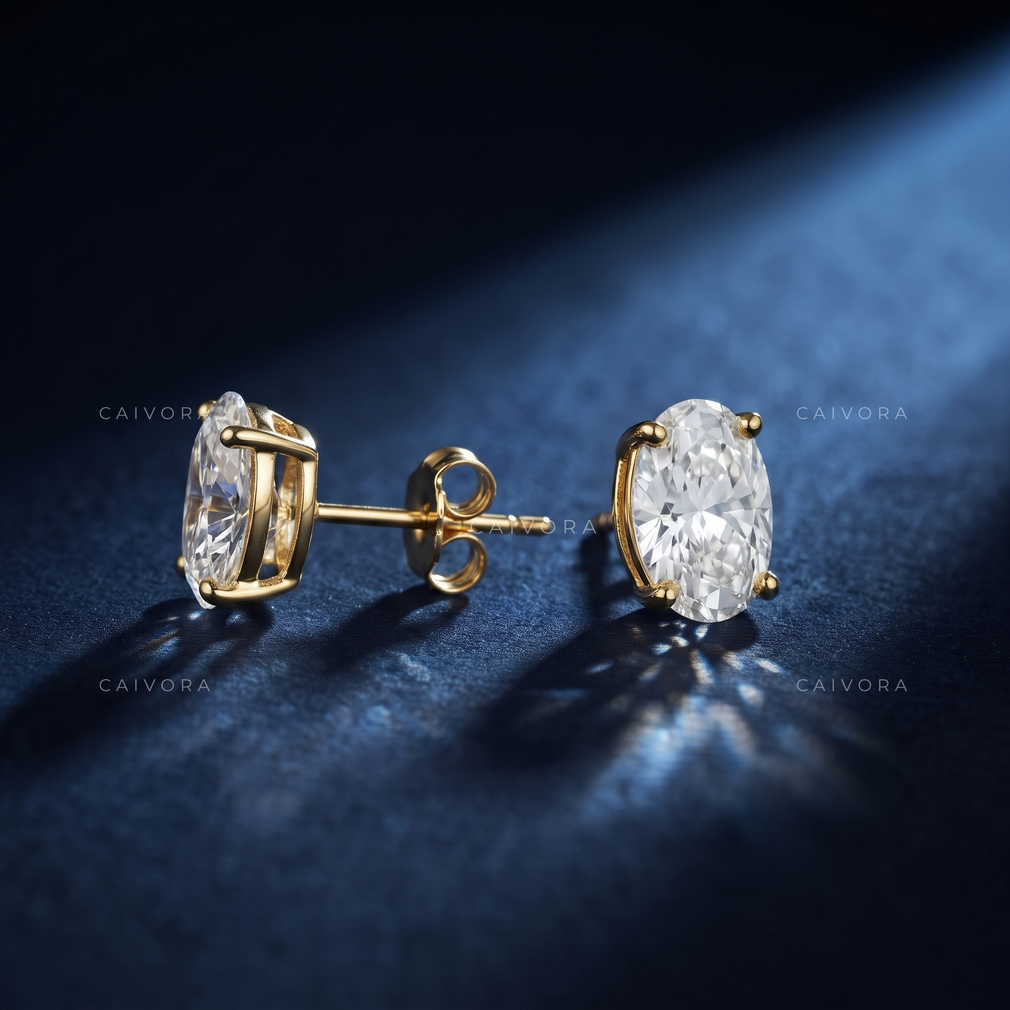 Prism Radiance Four-Prong Oval Solitaire Stud Earrings