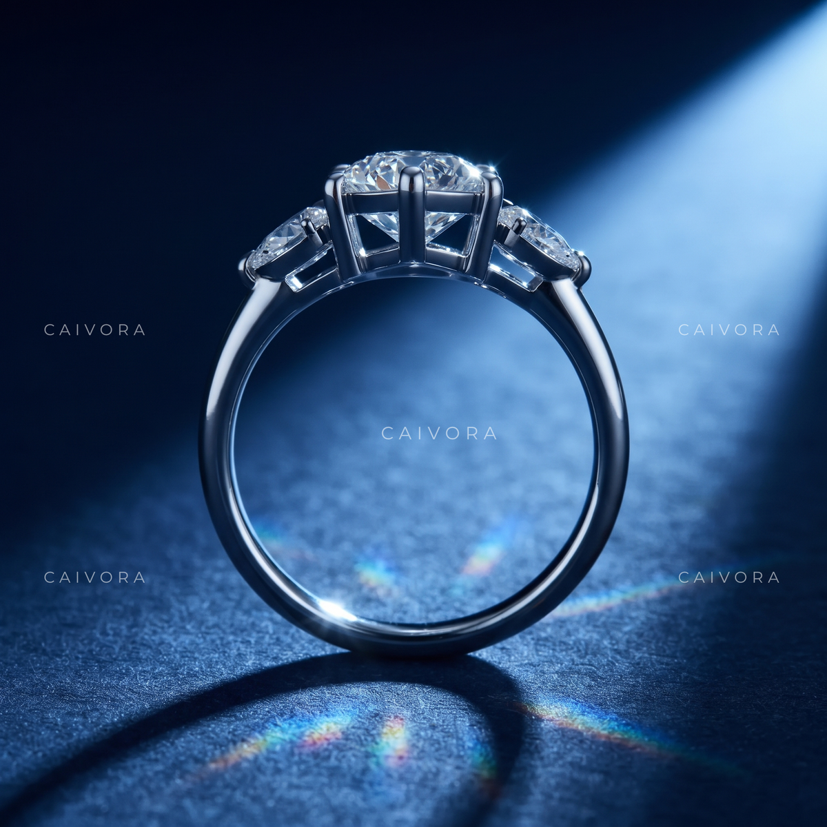 A Distinctive Three Stone Setting Featuring a Hexagon Cut Center