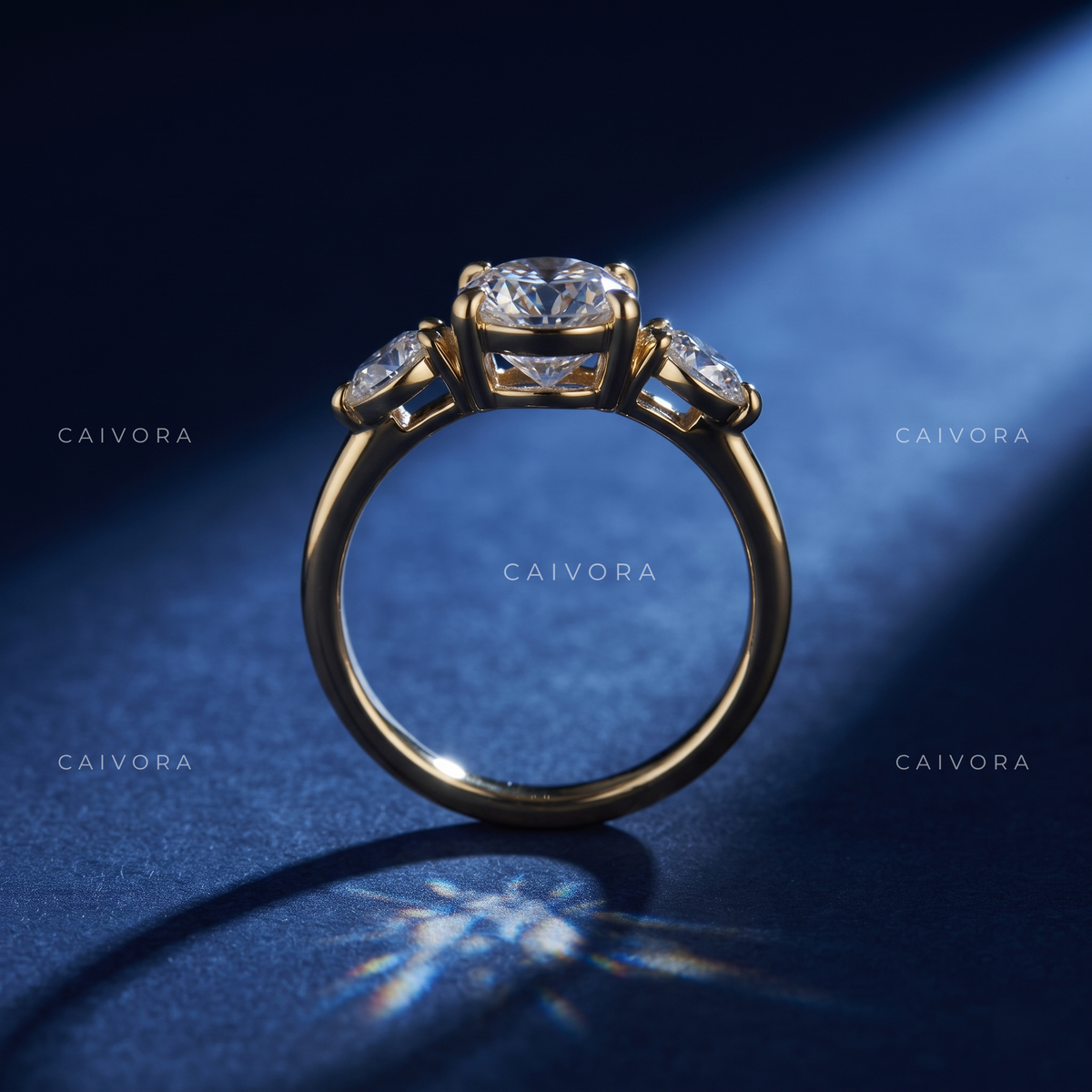 Brilliant Round Cut Center in a Distinctive Three Stone Diamond Ring