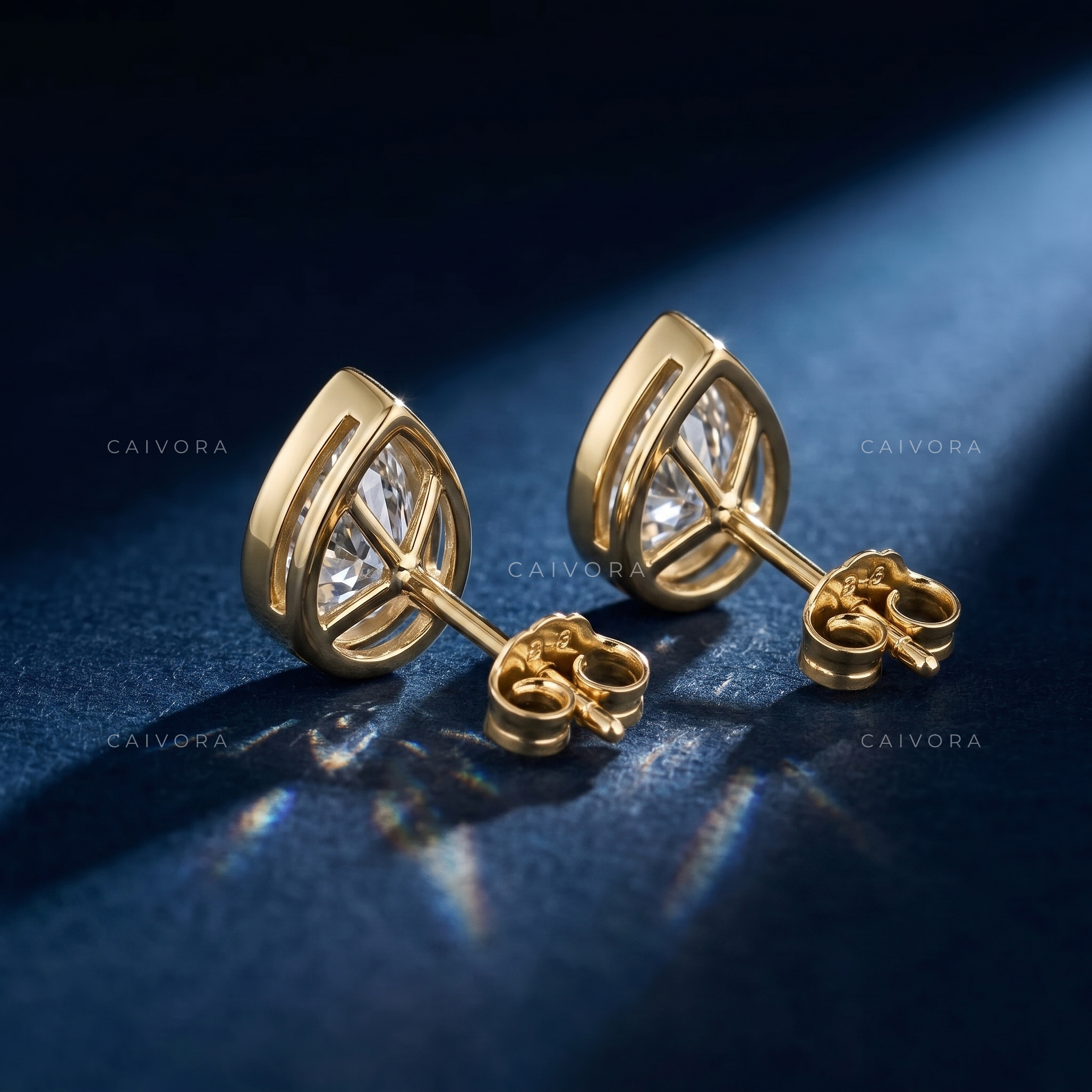 The Serenelle Pear Solitaire Studs