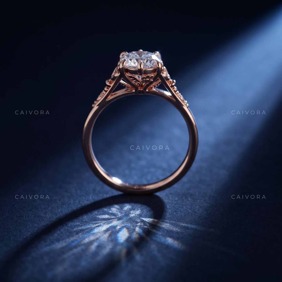 Roselle Contour Ring with a Pear-Shaped Diamond