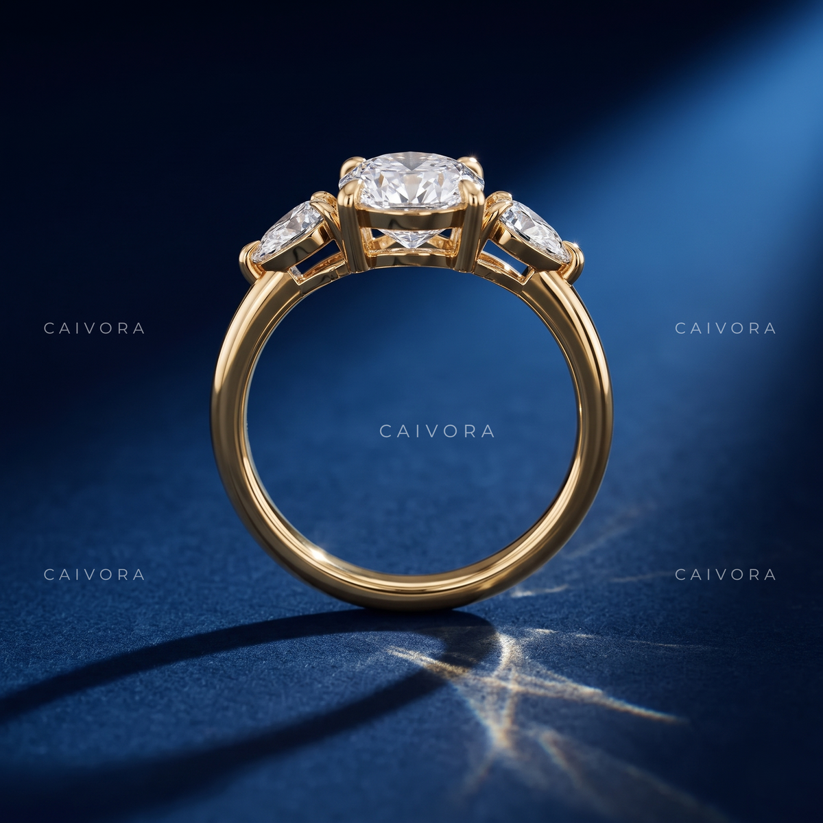 Sophisticated Three Stone Setting Highlighting an Oval Cut Center Diamond