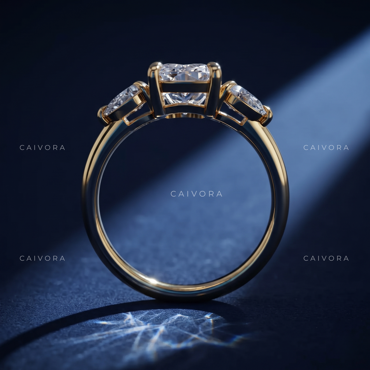 Romantic Three Stone Engagement Ring with a Cushion Cut Center