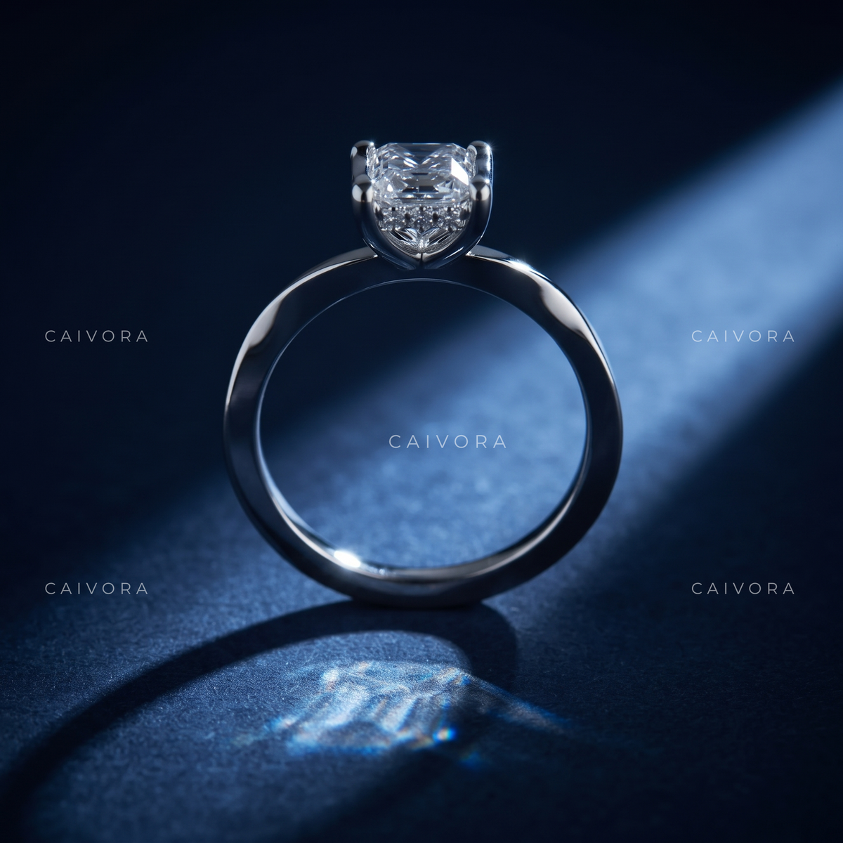 Emerald Cut Engagement Ring with a Refined Hidden Halo