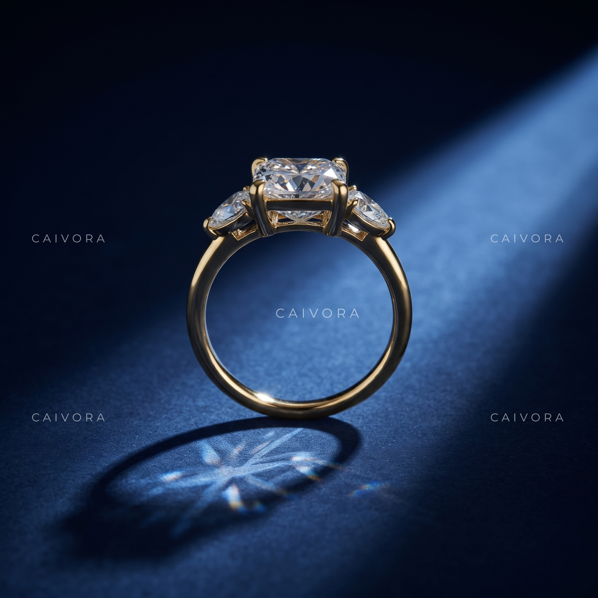 Vintage Inspired Three Stone Setting with an princess cut Center