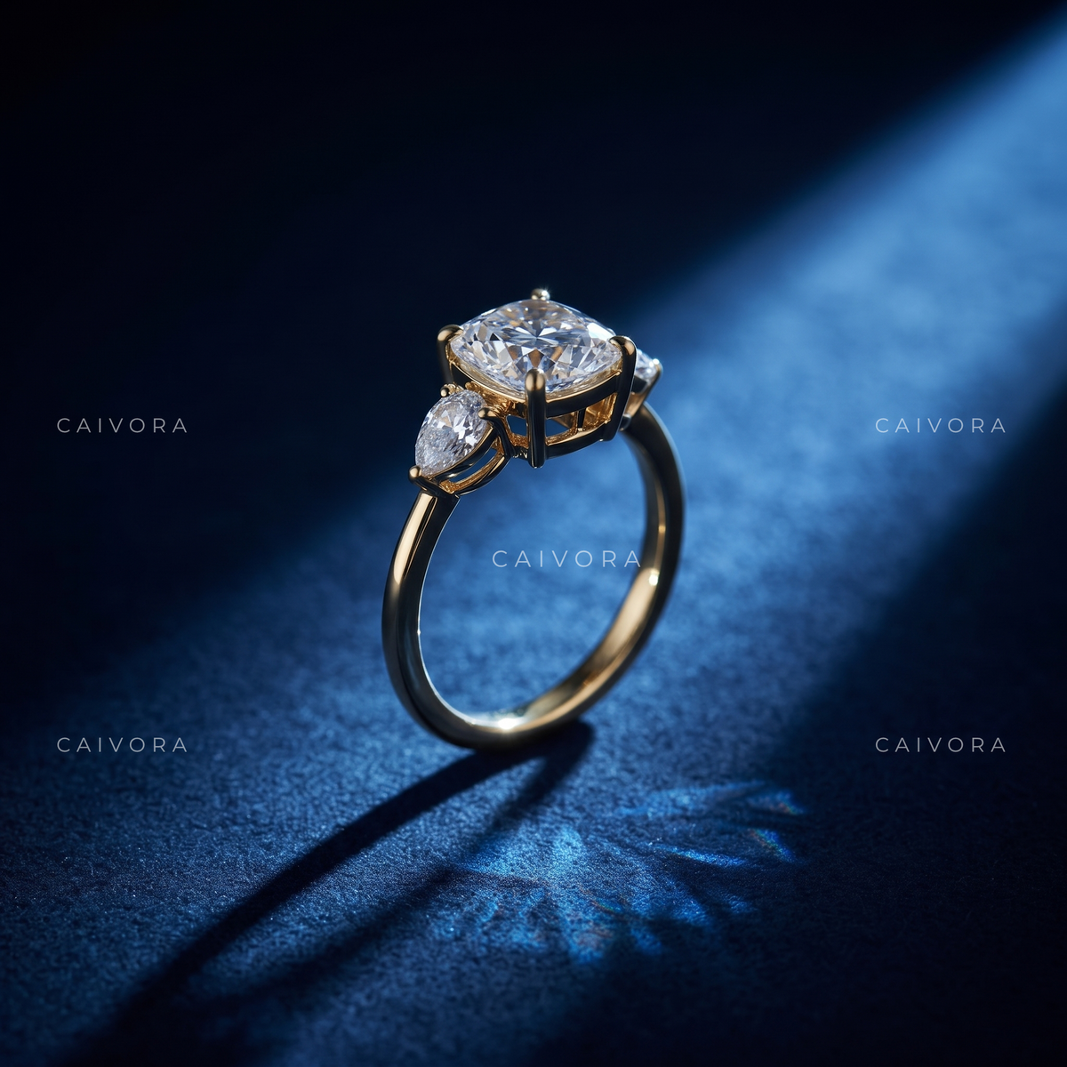 Graceful Three Stone Diamond Ring Featuring a Cushion Cut Center