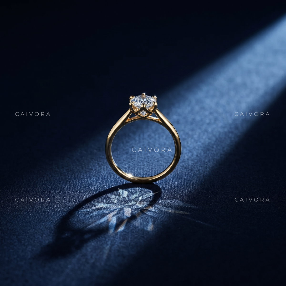 Refined Tapered Cathedral Setting with a Pear Cut Center Diamond