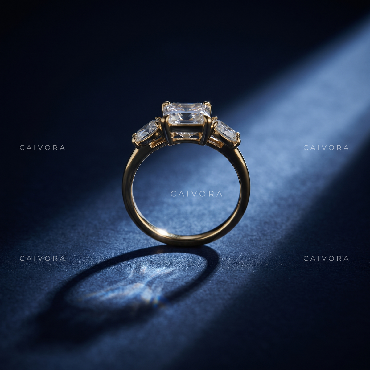 Geometric Three Stone Engagement Ring with an Asscher Cut Center Diamond