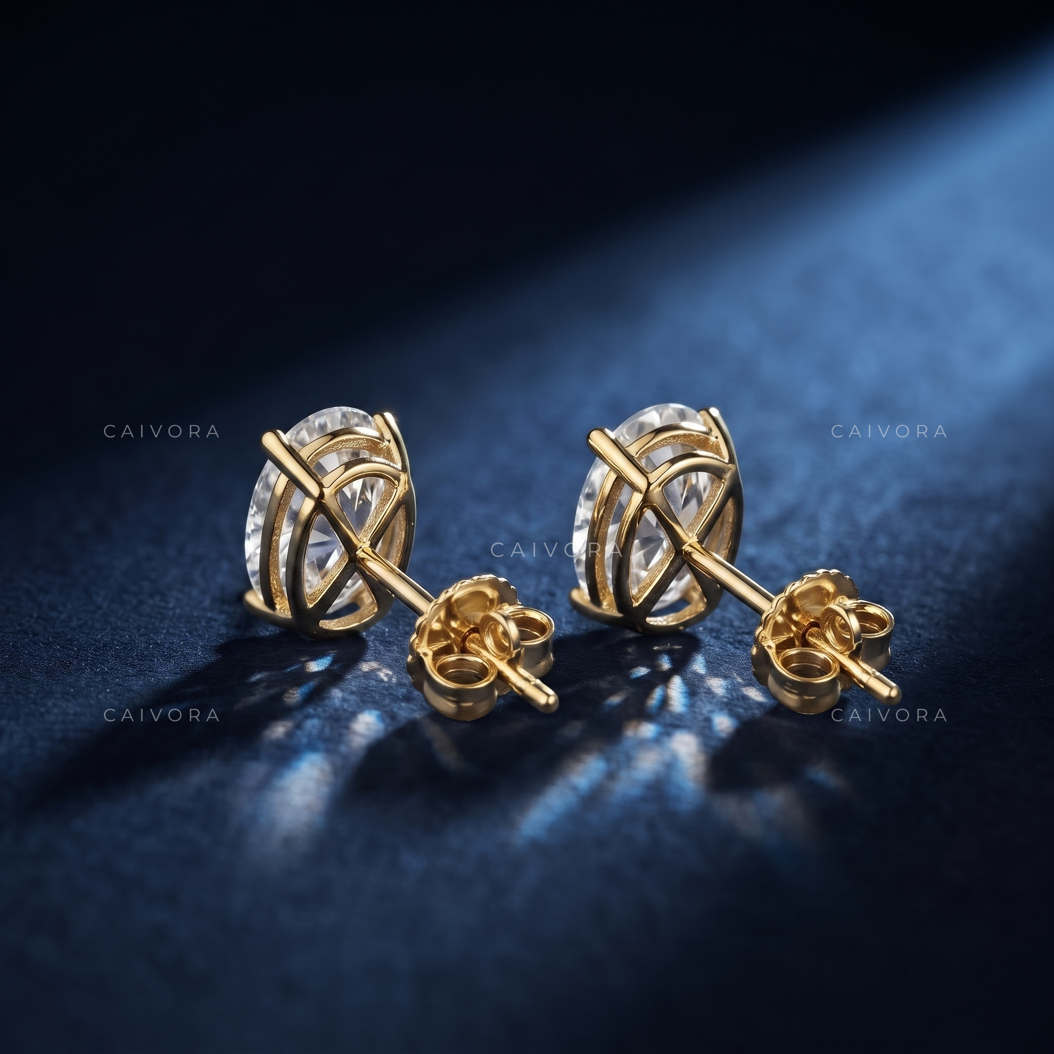 Prism Radiance Four-Prong Oval Solitaire Stud Earrings