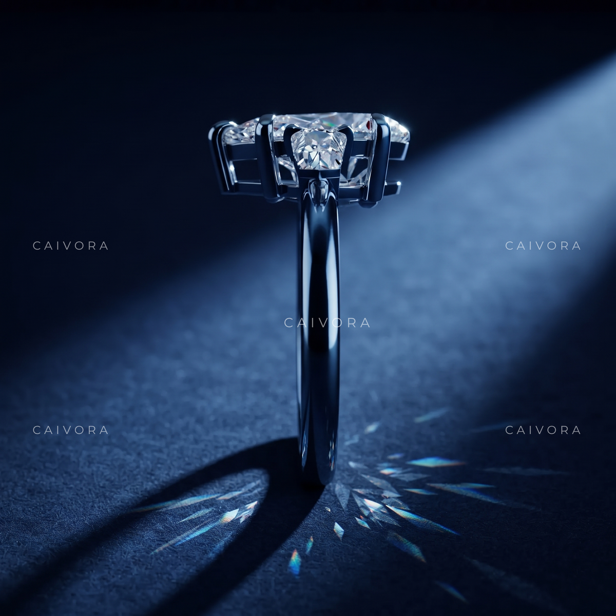 Graceful Contours with a Pear Cut Center Diamond