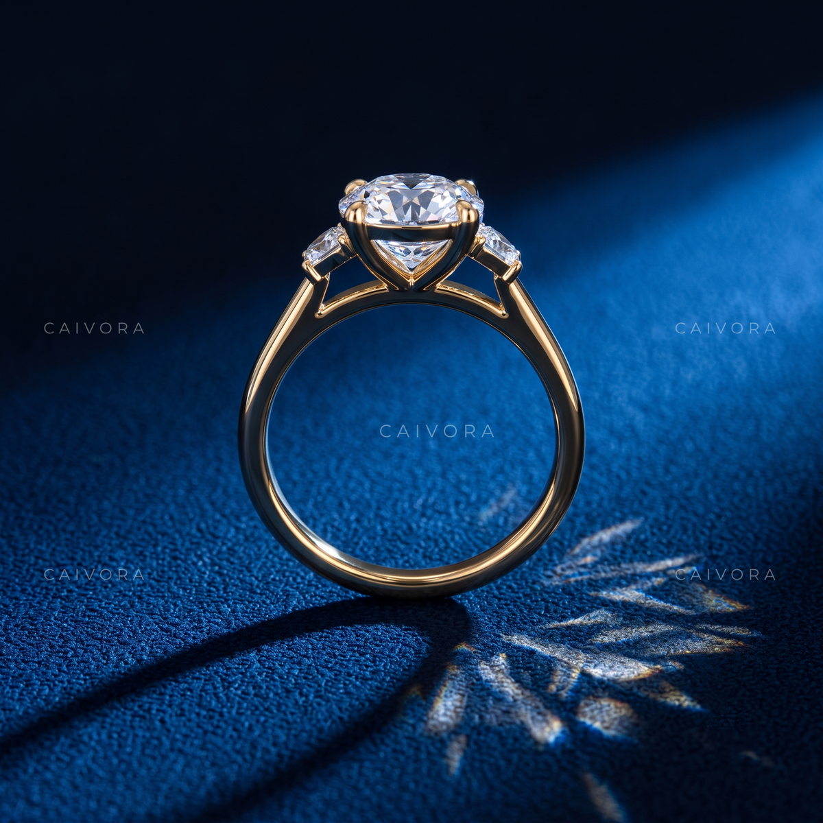 Signature Three Stone Diamond Ring with Round Center & Trapezoid Accents