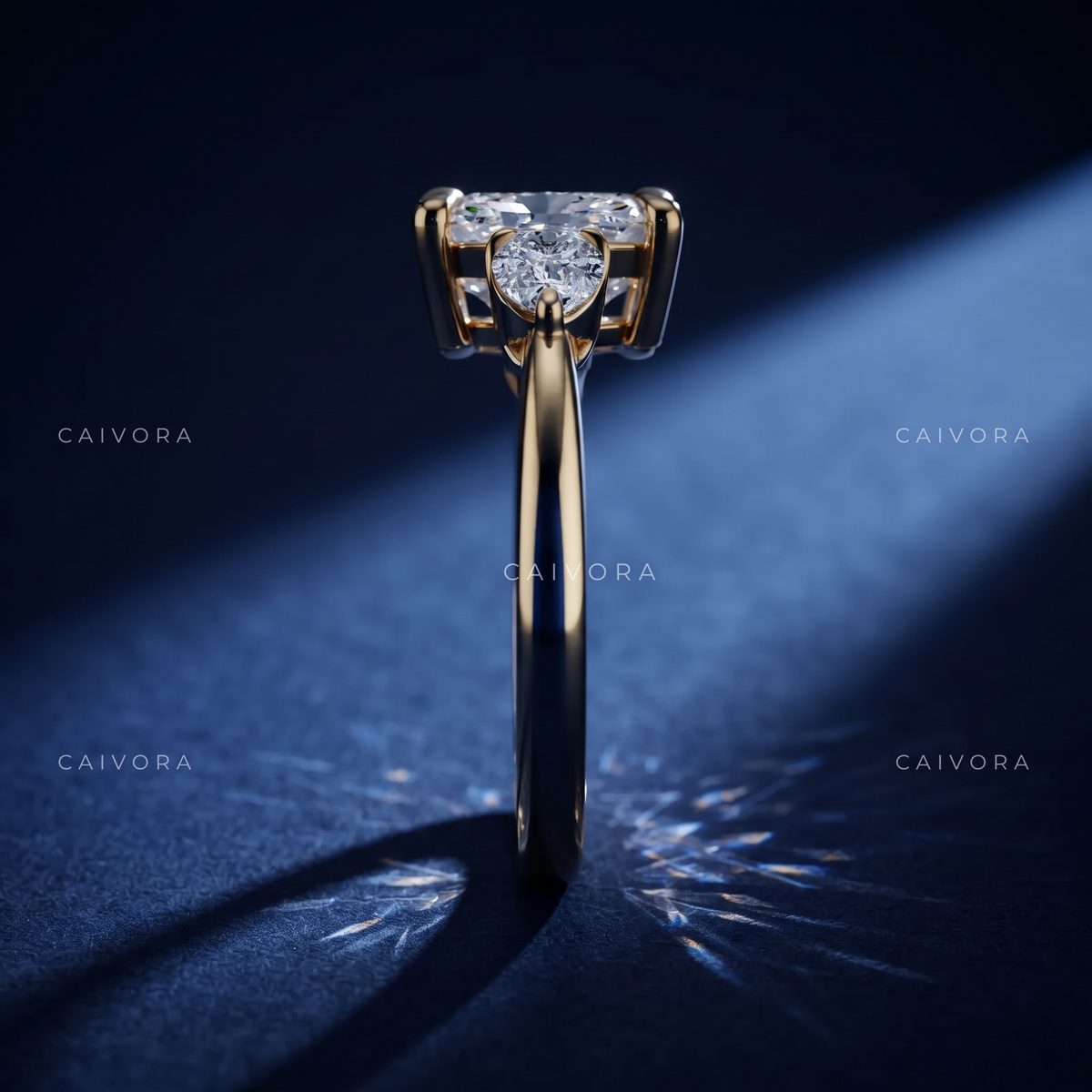 Romantic Three Stone Engagement Ring with a Cushion Cut Center