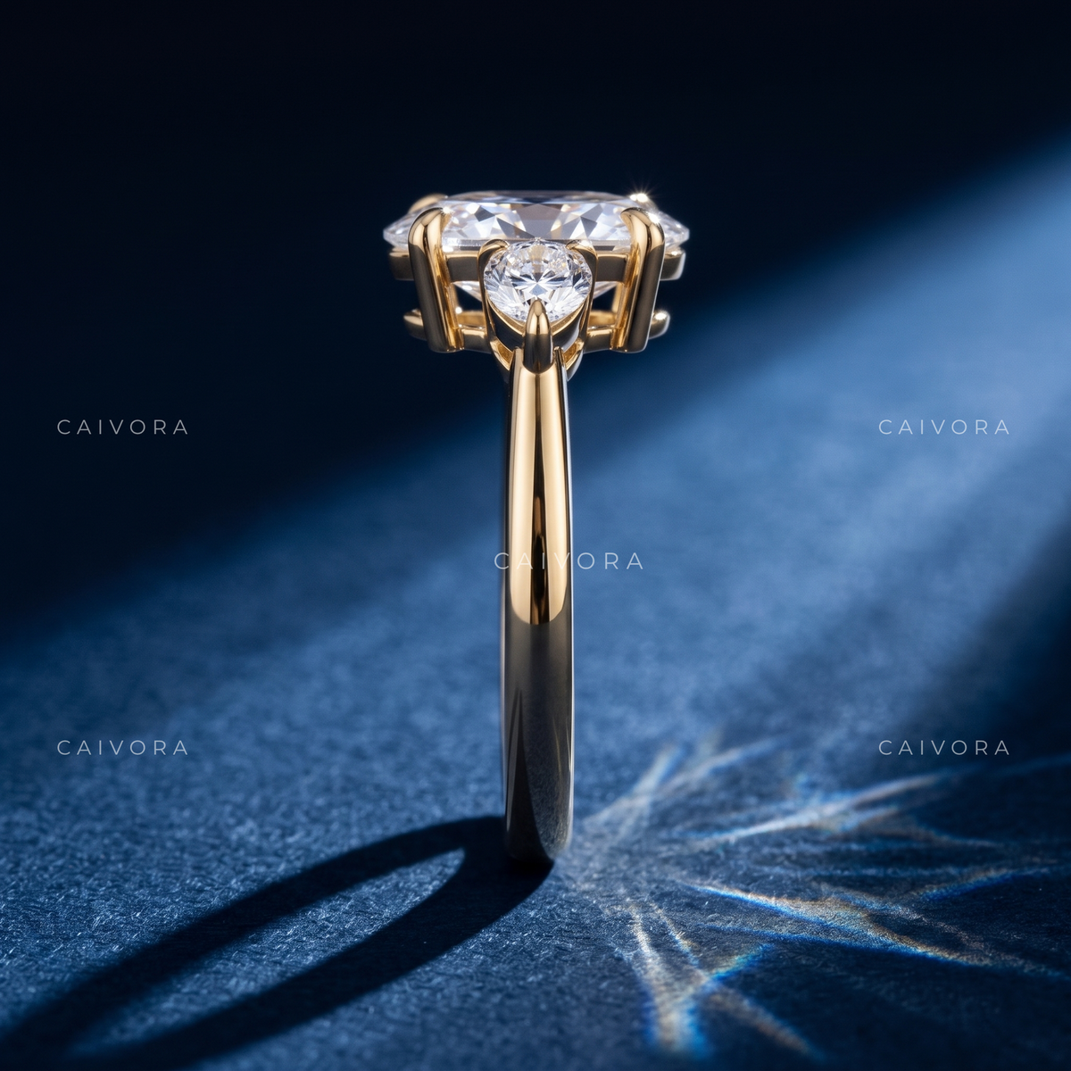 Sophisticated Three Stone Setting Highlighting an Oval Cut Center Diamond