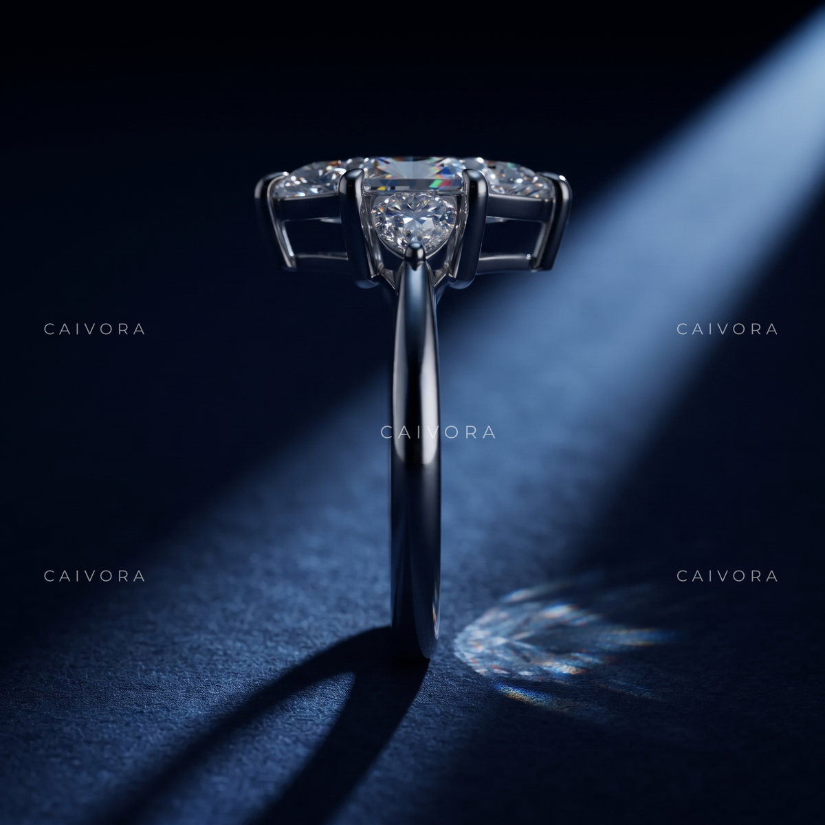 A Distinctive Three Stone Setting Featuring a Hexagon Cut Center