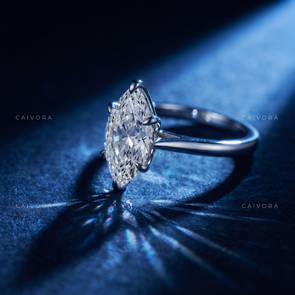 Distinctive Tapered Cathedral Engagement Ring with a Marquise Cut Diamond