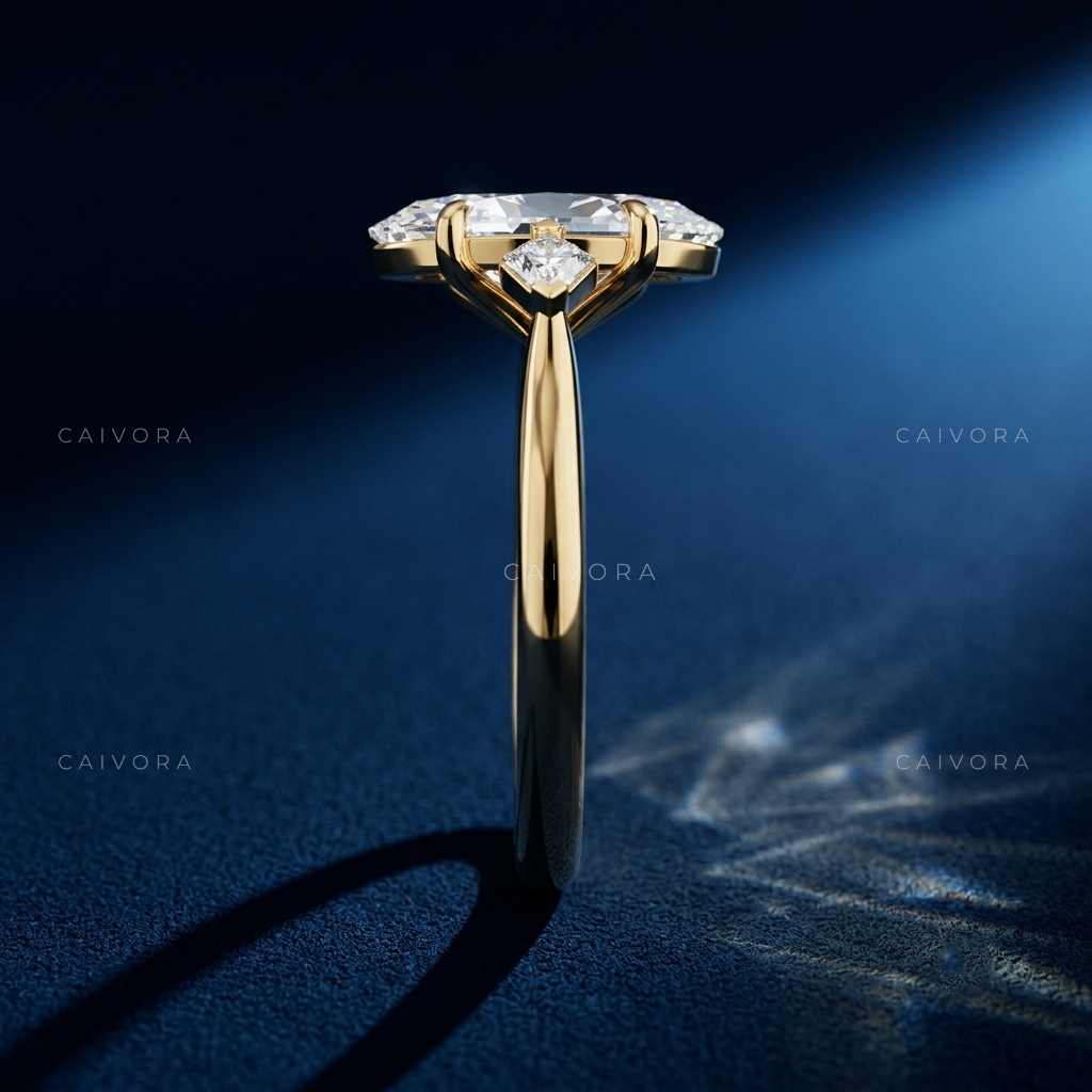Refined Three Stone Engagement Ring with Moval Diamond & Kite Accents