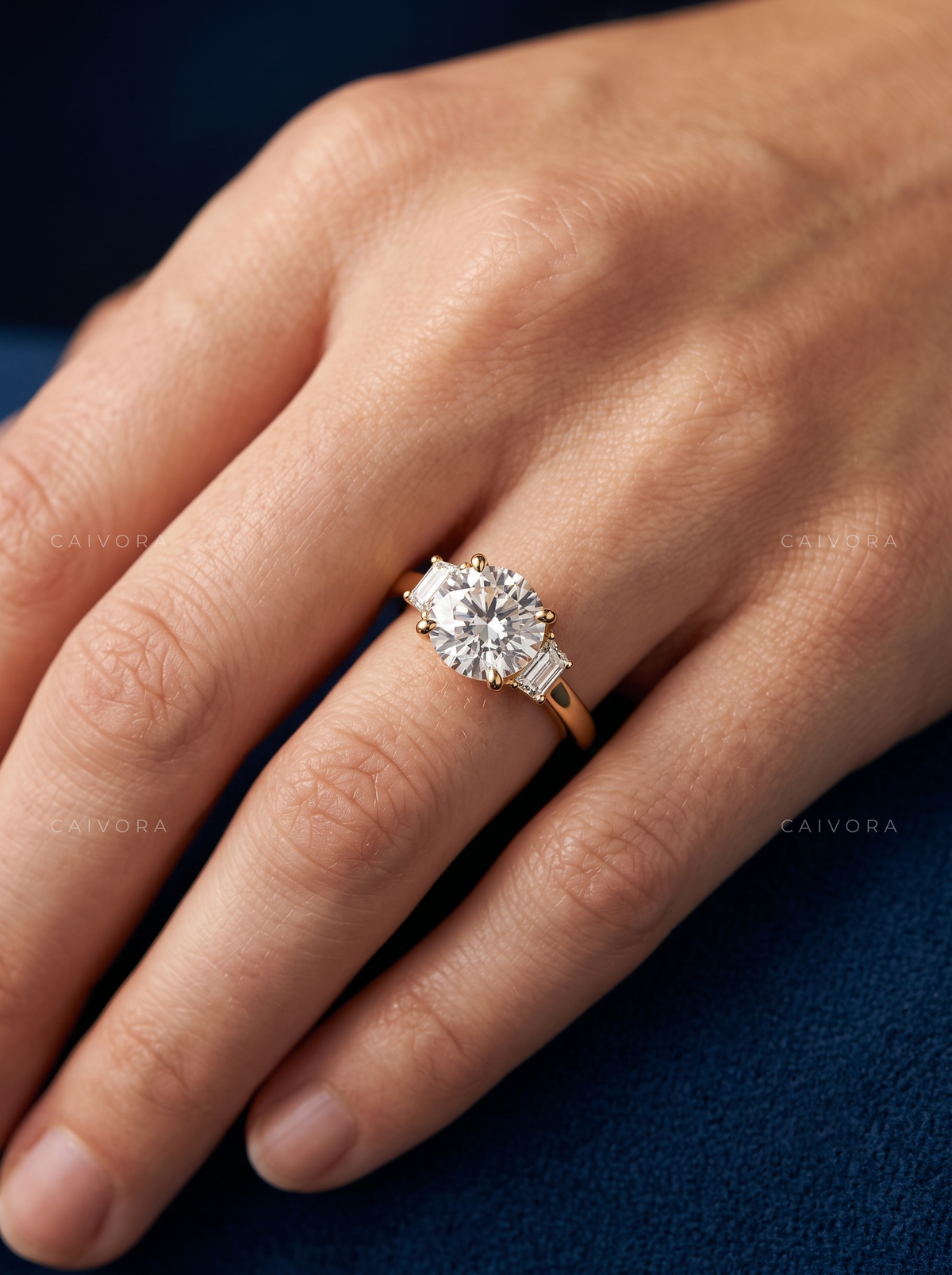 Signature Three Stone Diamond Ring with Round Center & Trapezoid Accents