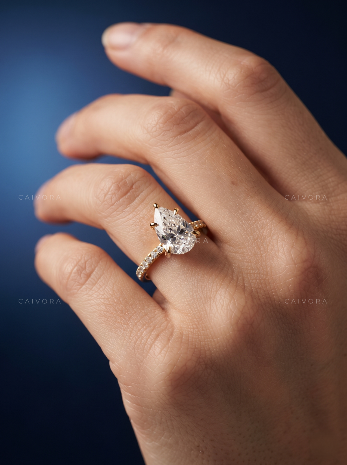 Pear Shaped Diamond Solitaire Engagement Ring