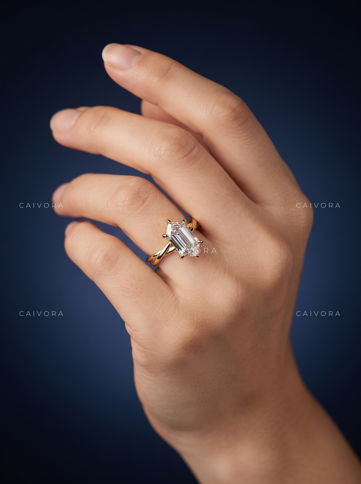 Modern Sophistication with an Elongated Hexagon Step Cut Center