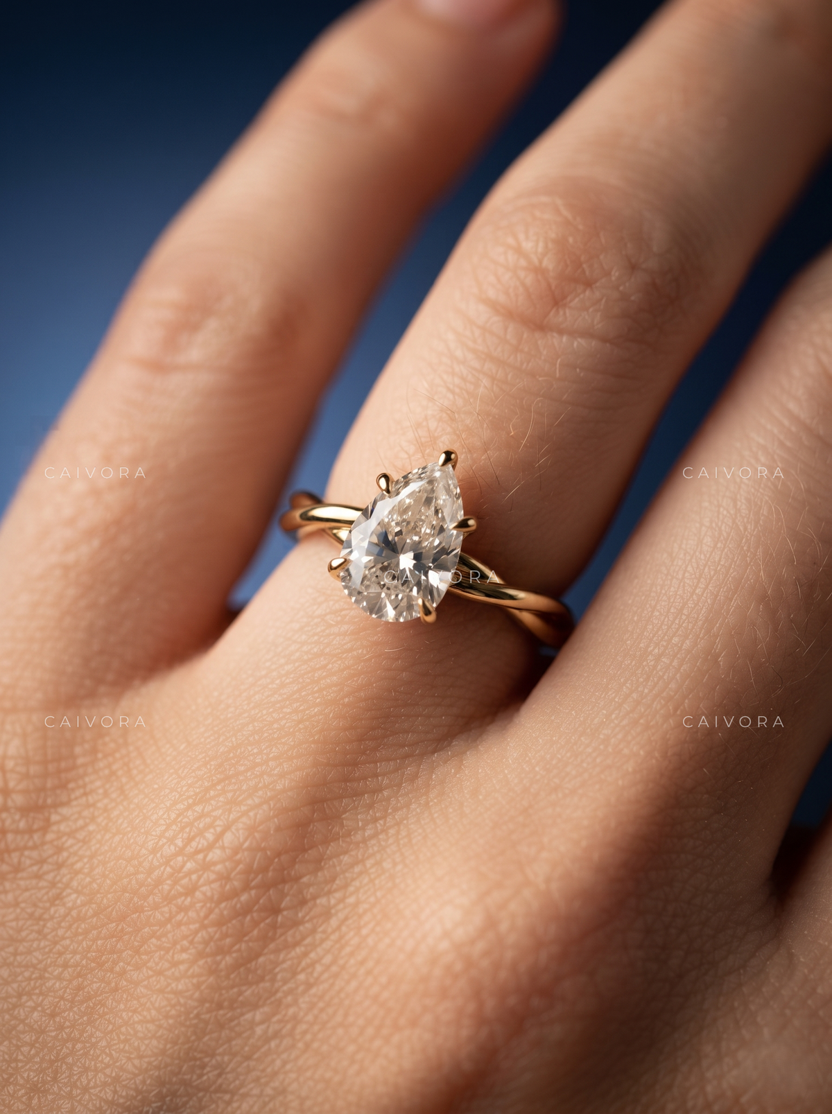 Petal Radiance Kosina Engagement Ring with a Pear Cut Diamond