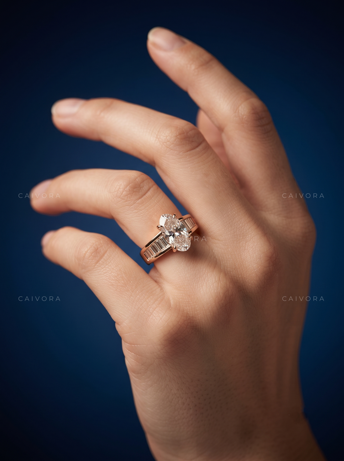 Moval Diamond Channel Setting Engagement Ring with Baguette Accents