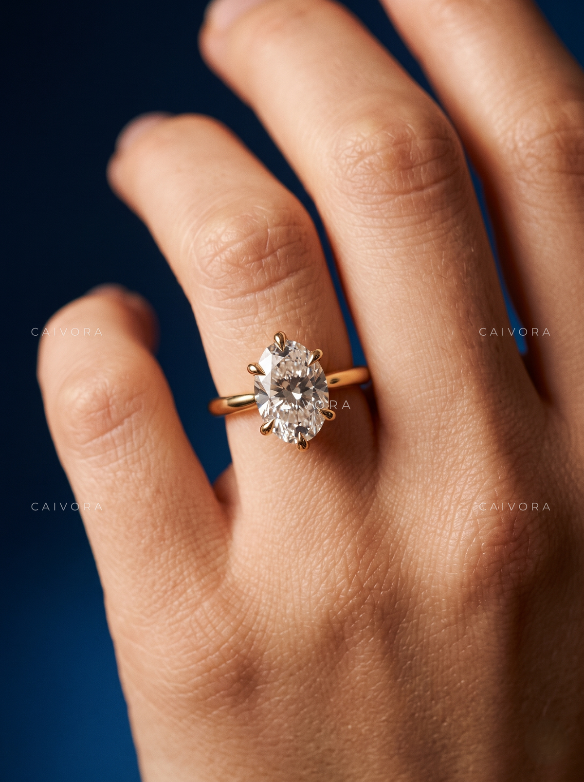 Timeless Tapered Cathedral Engagement Ring with an Oval Cut Diamond