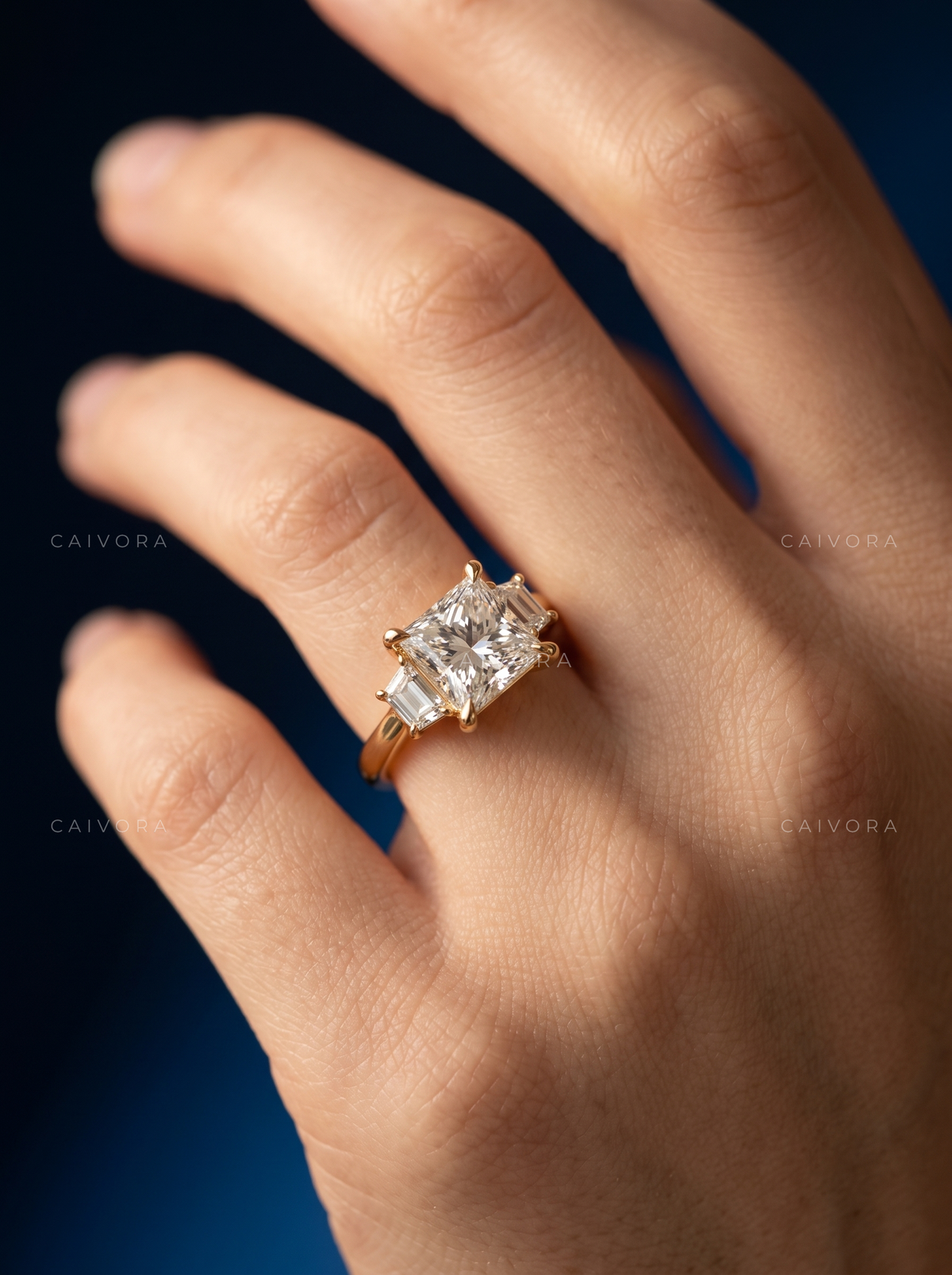 Modern Three Stone Engagement Ring with Princess Diamond & Trapezoid Accents
