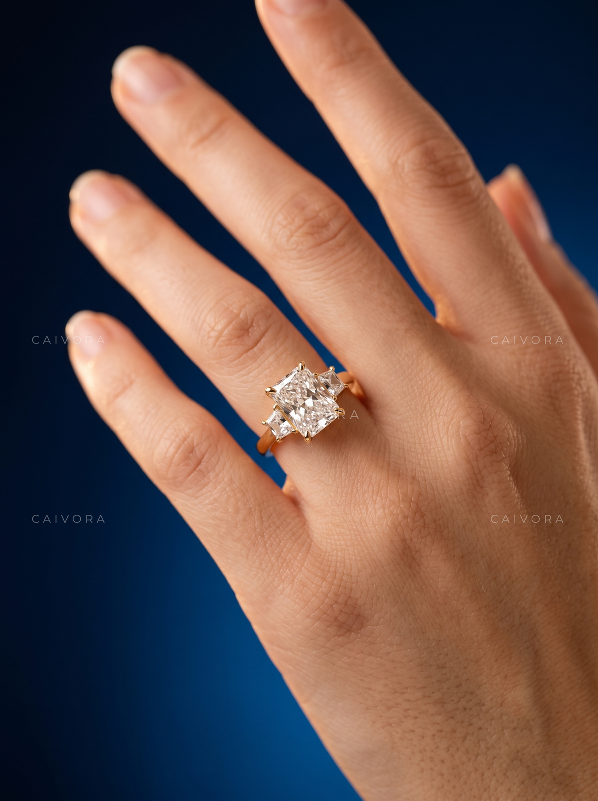Refined Three Stone Engagement Ring with Radiant Diamond & Trapezoid Accents